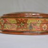 Round Kashmiri papier mache jewelry box with hand painted Persian paisley design and lacquered finish