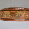 Round Kashmiri papier mache jewelry box with hand painted Persian paisley design and lacquered finish