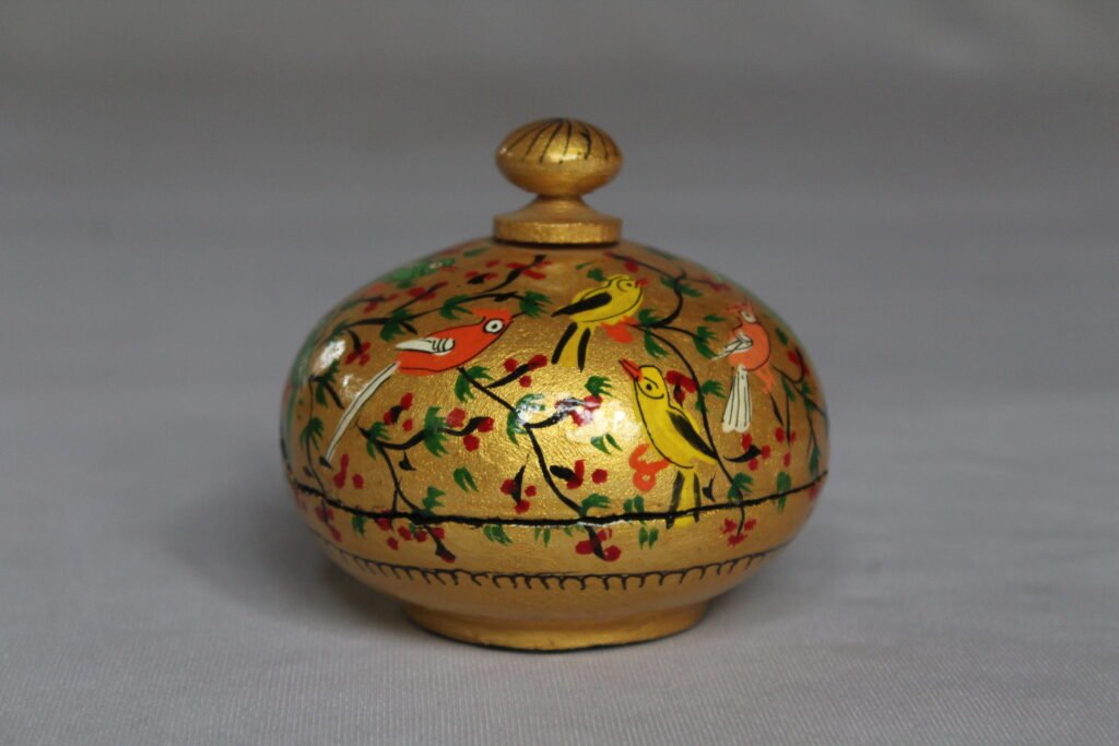 Golden round papier mache box