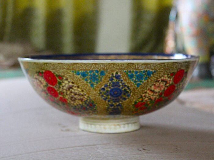 Hand painted Kashmiri papier mache bowl with floral design and blue gold interior